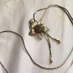 Long gold flower necklace